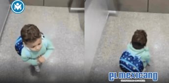 Niño ora al quedar atrapado en elevador y el video desata debate en redes
