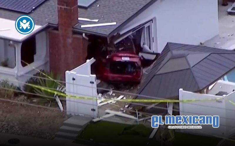 Tesla choca contra vivienda en San Diego; deja seis lesionados