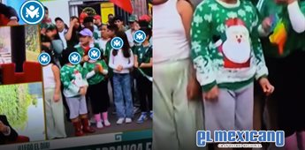 Ni&ntilde;o apoya a la Selecci&oacute;n Mexicana con su&eacute;ter de navidad